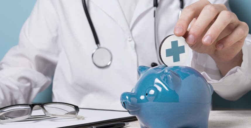 front-view-doctor-holding-medical-element front view doctor holding medical element scaled